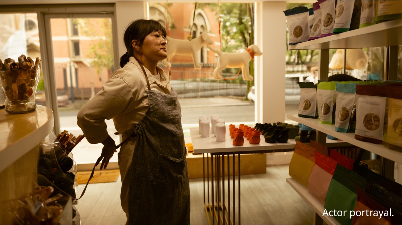Woman tying an apron around her waist 